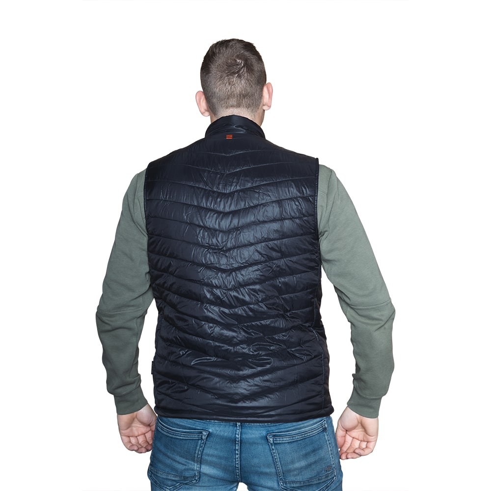 Deze verwarmde bodywarmer is zowel boven als onder nauwsluitend.